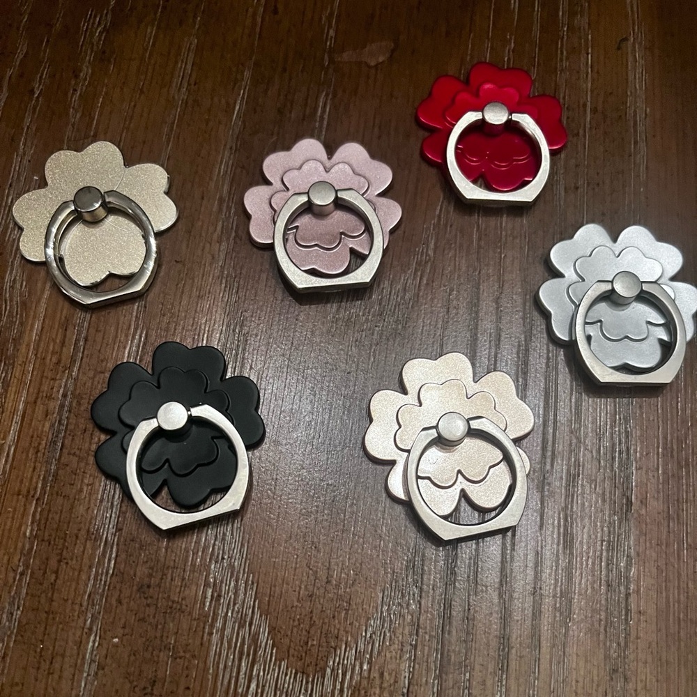 Lot of 6 metal phone ring holder and 1 kate spade phone ring holder